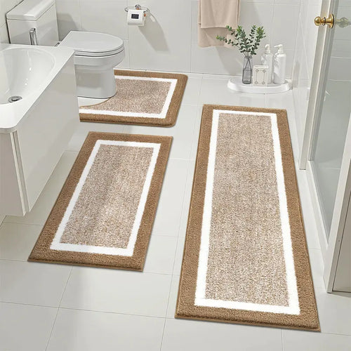 Beige three-piece bathroom rug set