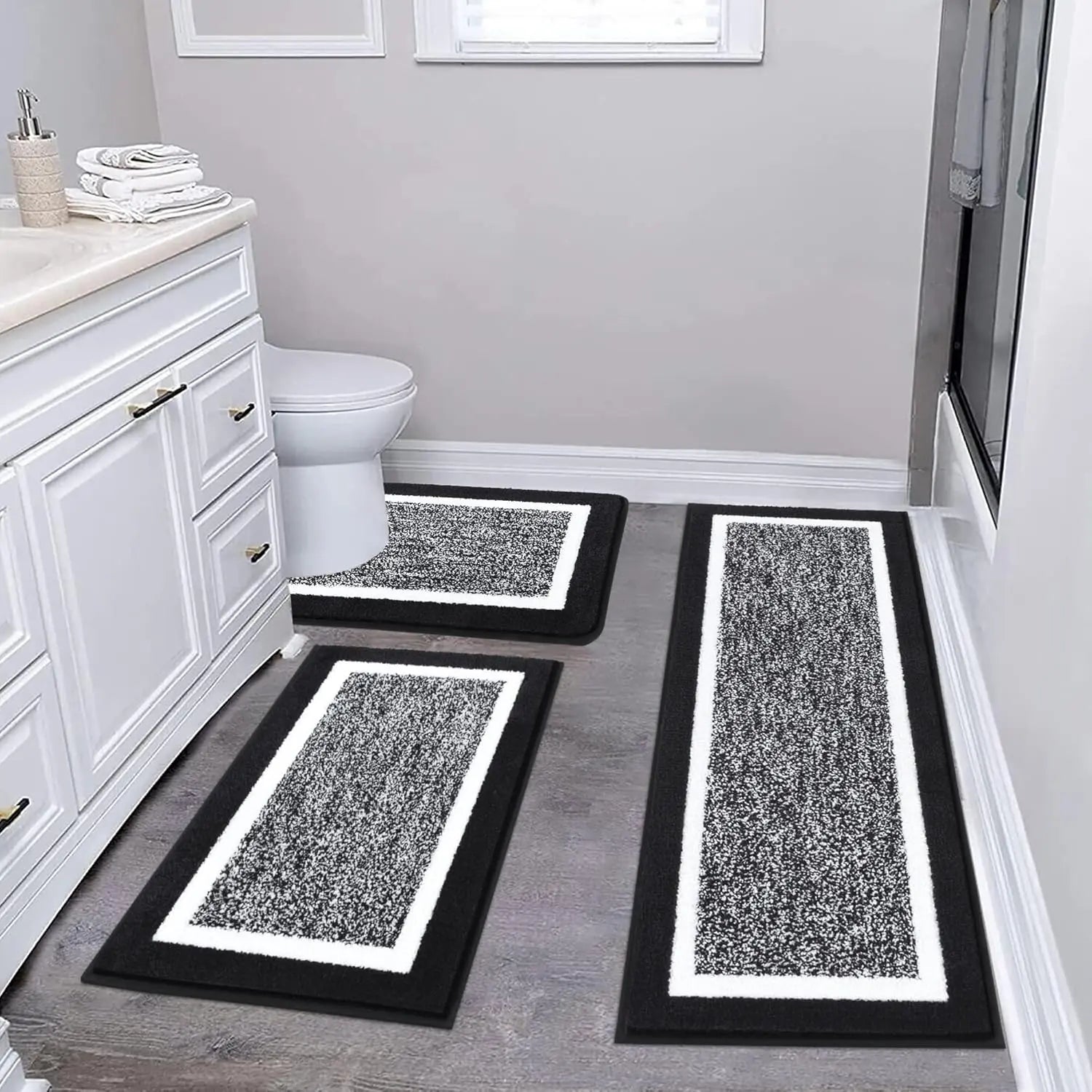 Black three-piece bathroom rug set