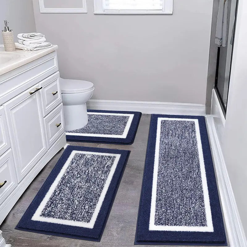 Blue three-piece bathroom rug set