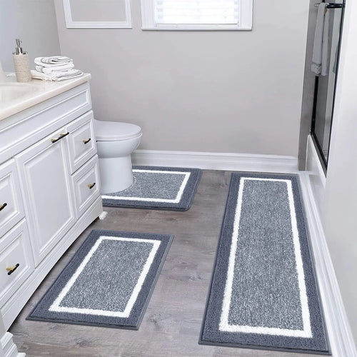 Gray three-piece bathroom rug set